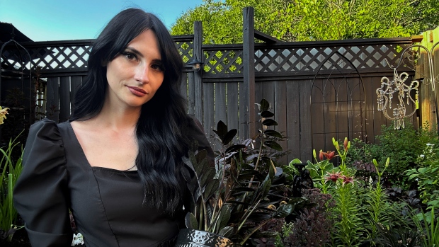 Dark flowers thriving in backyard 'goth garden'; Chloe Hurst has various shades of darker plants growing in her garden in Carleton Place, Ont\., amassing more than 230,000 followers on Instagram\.