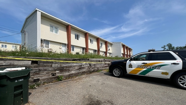 Suspect arrested after body found in Sydney apartment; A police cruiser was stationed outside an apartment complex on MacAulay's Lane in Sydney on Wednesday afternoon\. 