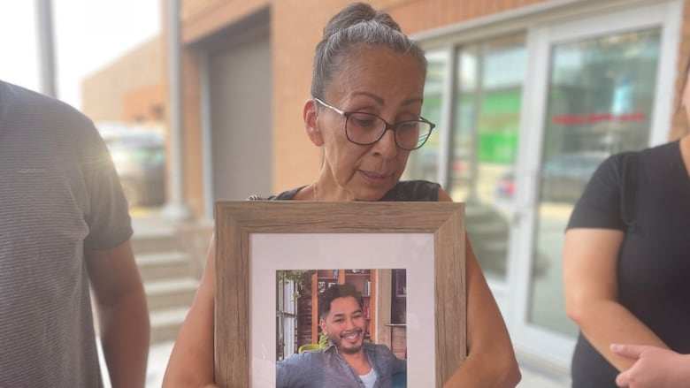 woman holding picture