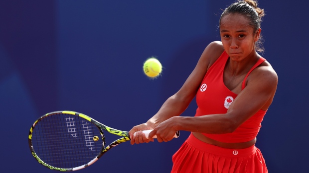 Fernandez advances in singles and doubles, Andreescu falls in 2nd round after suffering wrist injury; Canada's Leylah Fernandez, pictured on Sunday, will next face Germany's Angelique Kerber in the third round of the Olympic women's singles tournament at Roland Garros Stadium\.