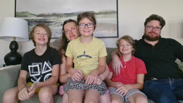Travel-nurse company turned my life upside down, health worker says; Youenn Siviniant, right, moved to Edmundston with his family from France after being recruited as a travel nurse with Canadian Health Labs\. 