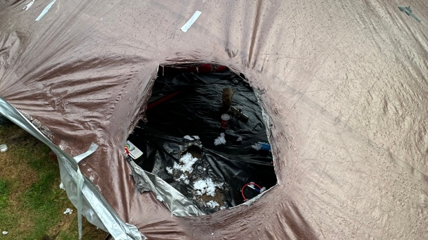 Charlottetown police investigating report of fire at protest encampment; A photo submitted by one of the protesters shows fire damage to one of the tents at the encampment\. 