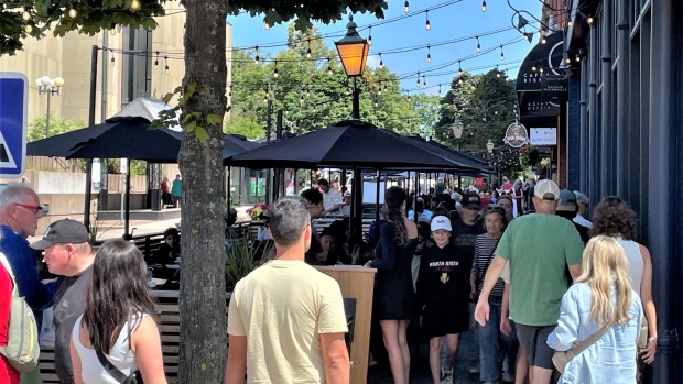 If you market it, they will come — but some say P.E.I. tourism should go beyond 'driving revenue'; A crowd of people on Charlottetown's Victoria Row\.