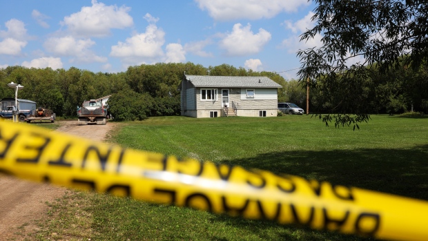 People in McCreary, Man., grapple with triple homicide; A house sits on a property cordoned off by police tape southeast of the village of McCreary\. Police could be seen going in and out of the house Friday night, hours after RCMP held a press conference\. 