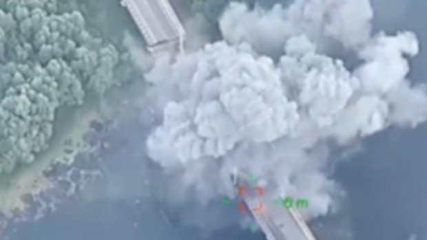 Ukrainian forces strike 2nd bridge in Russia's Kursk area; Smoke billows from a bridge over the Seym river in the Glushkovo district, following a Ukrainian strike in the Kursk region, Russia, in this still image taken from a social media video released on August 16, 2024\. Ukraine's Air Force Commander Mykola Oleshchuki/via REUTERS  THIS IMAGE HAS BEEN SUPPLIED BY A THIRD PARTY\. MANDATORY CREDIT\. NO RESALES\. NO ARCHIVES\.
