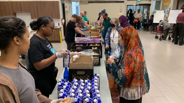 At this food bank, you can get produce, test your blood sugar and get a specialist referral; Potatoes, apples, lettuce, peppers, milk and more are all available for residents at Adanac Apartments to pick up free of charge at the bi-weekly food program\.