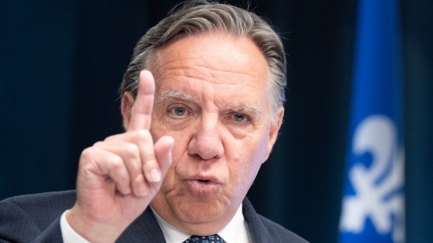 Quebec premier pushes for plan to improve manners, discipline in schools; Quebec Premier Francois Legault announces changes to Quebec's immigration policies during a news conference in Montreal\.