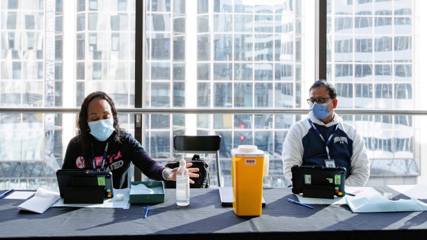 You might want to wait until fall for your next COVID-19 shot, doctors say. Here's why; Toronto Public Health nurses hold a flu and COVID-19 vaccination clinic at Toronto Metropolitan University on Jan\. 26, 2023\.