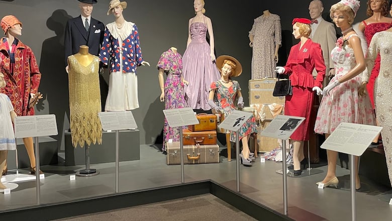 A enactment      of mannequins dressed successful  covering  from the 20th century.