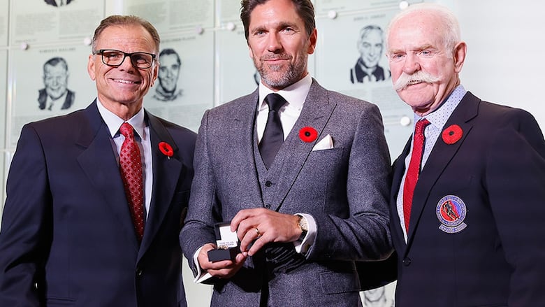 From left: Mike Gartner, Henrik Lundvist and Lanny McDonald celebrate Lundqvist's induction into the Hockey Hall of Fame at a press opportunity at the Hockey Hall Of Fame on Nov. 10, 2023 in Toronto.