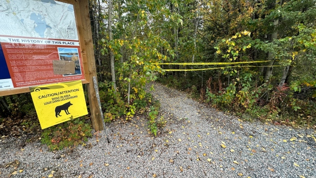 Popular Yellowknife-area hiking trail closed after wolf attack; Signs and tape warn people away from the entrance to the Ranney Hill trail north of Yellowknife on Tuesday as wildlife officers continue to investigate a wolf attack\.