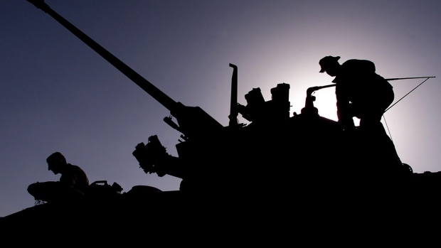 Ukraine desperately needs surplus Canadian armour, ambassador tells MPs; Members of the Lord Strathcona Horse regiment get into a Coyote armoured surveillance vehicle at Kandahar Airbase in Kandahar, Afghanistan Tuesday February 5, 2002\. They are part of the initial deployment of a 750-soldier force that is part of Operation Apollo\.
