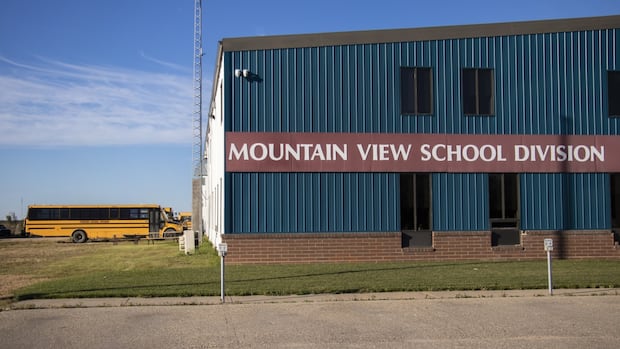 Cancelling God Save the King anthem for schools violated the law, Manitoba trustee says in court action