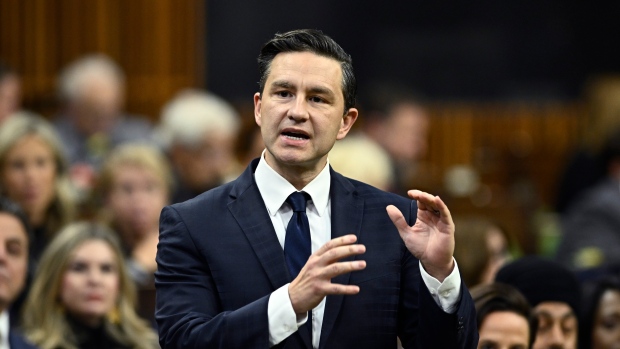 Liberal House leader accuses Poilievre of 'hiding something' by refusing security clearance; Conservative Leader Pierre Poilievre rises during Question Period in the House of Commons on Parliament Hill, in Ottawa, Monday, Oct\. 7, 2024\.