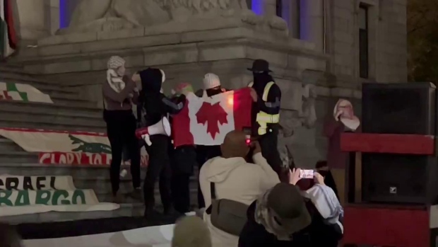 Leaders condemn B.C. rally where 'death to Canada' cry went up; In a still of a video posted online, protesters at a pro-Palestinian rally are seen burning a Canadian flag as some chant 'death to Canada, death to the United States and death to Israel\.'