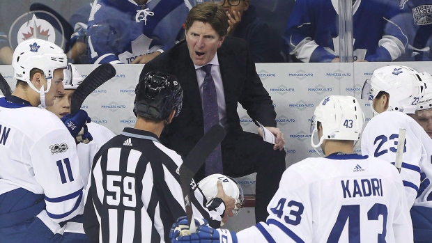 Nazem Kadri book recounts Mike Babcock's behaviour coaching Toronto Maple Leafs; In this 2017 file photo, Maple Leafs head coach Mike Babcock speaks with an official while Nazem Kadri watches\. Kadri detailed his experience being coached by Babcock in a new book "Dreamer: My Life On The Edge\."