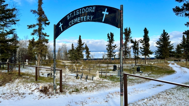 Concerned Fort Smith, N.W.T., residents call for completion of cemetery fence; The cemetery entrance in Fort Smith\. Residents say the fence has been standing half-completed for several years\.