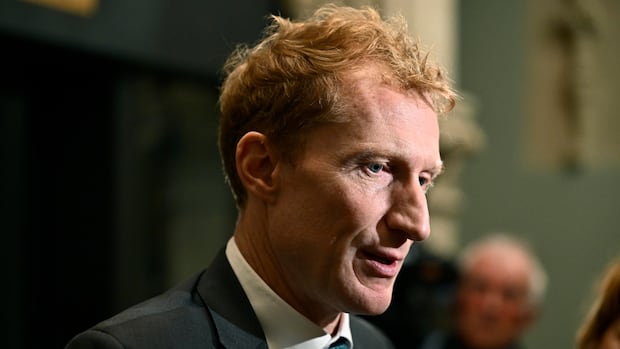 Canada still an 'open country' despite immigration cuts, says minister | CBC News