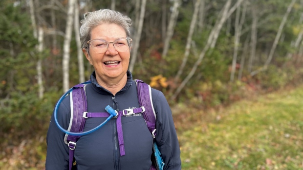 Nova Scotia woman celebrates being cancer-free by tackling the Island Walk; Anna Marie Kaiser with birch trees in the background\.