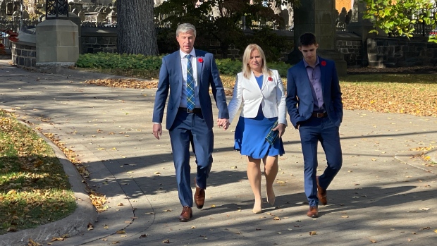 Nova Scotians heading to the polls Nov. 26 after early election call; PC Leader Tim Houston arrives at the home of the lieutenant-governor on Sunday, Oct\. 27, 2024, with his wife, Carol, and son, Zachary\. Nova Scotians will go to the polls Nov\. 26\.