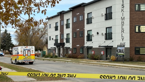 2 workers sent to hospital, 1 in critical condition, after electrical-hazard incident in Winnipeg; An ambulance is seen in front of an apartment complex at 615 Kimberly Ave\. Two people were taken to hospital following a work incident in the area Thursday morning\. 