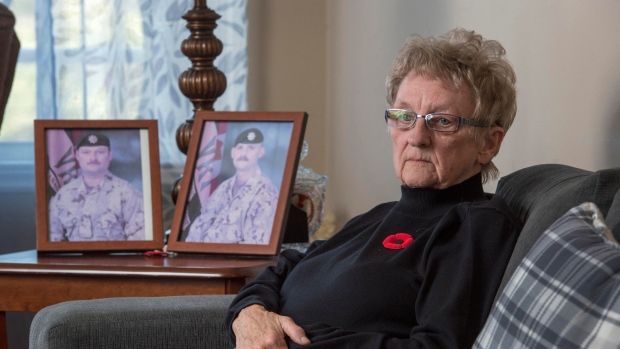 N.B. woman who lost 2 sons who served in Afghanistan named Silver Cross Mother; National Silver Cross Mother Maureen Anderson is shown with photos of her sons Sgt\. Ron Anderson, left, and Sgt\. Ryan Anderson, in her home in Oromocto, N\.B\. on Thursday, October 31, 2024\.   