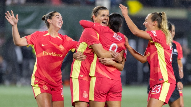 Christine Sinclair scores in her retirement match as her team clinches playoff spot; Portland Thorns forward Christine Sinclair, second from left, celebrates after her goal during the first half of an NWSL soccer match against Angel City FC at Providence Park on Friday Nov\. 1, 2024 in Portland, Ore\. 