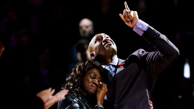 Toronto Raptors retire Vince Carter's No. 15; Former Raptors player Vince Carter reacts while hugging his mother, Michelle Carter, during his number retirement ceremony at halftime of an NBA basketball game between the Toronto Raptors and the Sacramento Kings in Toronto on Saturday, November 2, 2024\. THE CANADIAN PRESS/Christopher Katsarov