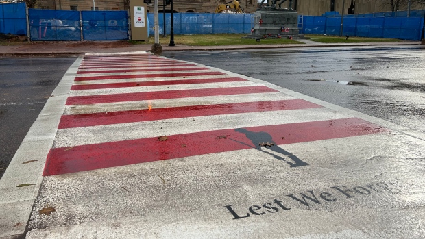 New Charlottetown crosswalk design honours fallen soldiers; Crosswalk painted in red and white stripes\.