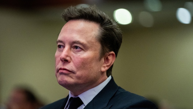 Elon Musk is on a tear as he shakes up politics in Europe. What's his endgame?; Tesla CEO and X owner Elon Musk listens as US President-elect Donald Trump speaks during a meeting with House Republicans in Washington, DC, U\.S\. on November 13, 2024\. 