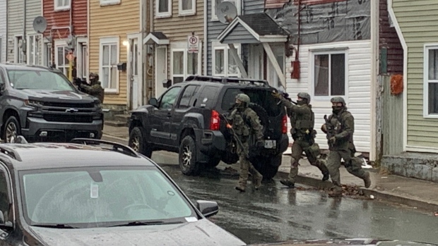 At least 1 man in custody after police standoff on Feild Street in St. John's; Police offers entered a home on Feild St with weapons drawn around 2:30 p\.m\. Saturday afternoon\. 