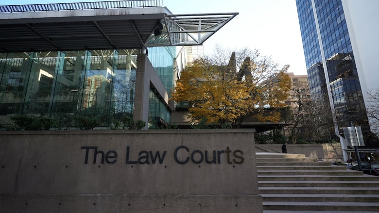 A concrete building with the words The Law Courts.