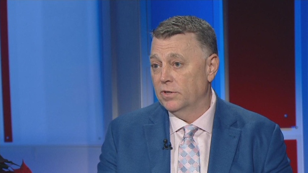 The year ahead is a 'challenge on the horizon,' says P.E.I. premier; Dennis King wears a blue suit jacket and a patterned tie on the set of CBC News: Compass