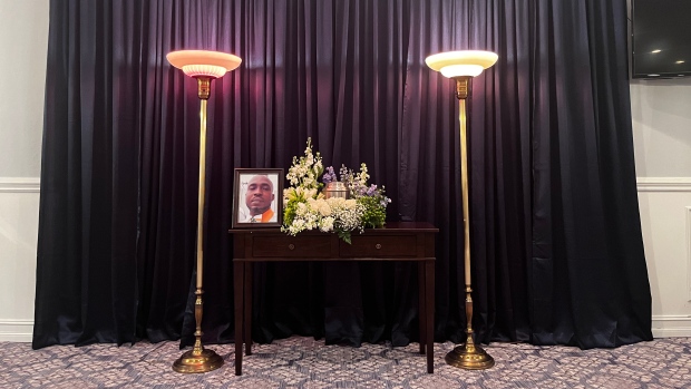 Quebec coroner says Fritznel Richard died of drowning, hypothermia; A portrait of Fritznel Richard was displayed at his funeral in Naples, Florida, on Jan\. 28, 2023\. Richard died attempting to cross into the United States from Canada in December 2022\.