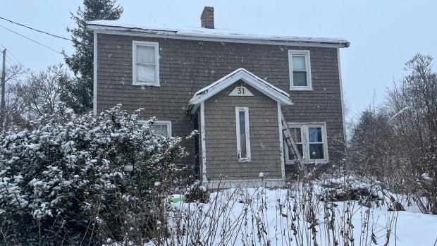 This house at 31 Kirkwood Drive in Charlottetown will soon be boarded up. The city will be coming in to seal off the house under its bylaws, because it says the home is now considered dangerous. A home in a winter scene.