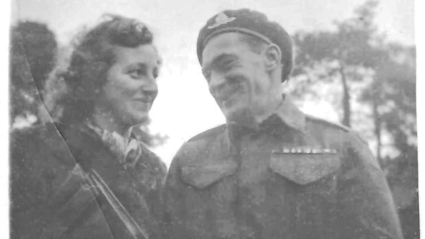 In a love letter to his sweetheart Selma, left, who was in Amsterdam at the time, gunner Sidney Smith, right, wrote of his undying love for Selma and how he couldn't wait for her to come to Canada. Pictured is a wedding photo of the couple. A black and white photo of a woman, left, and a man, right, smiling and looking at each other.