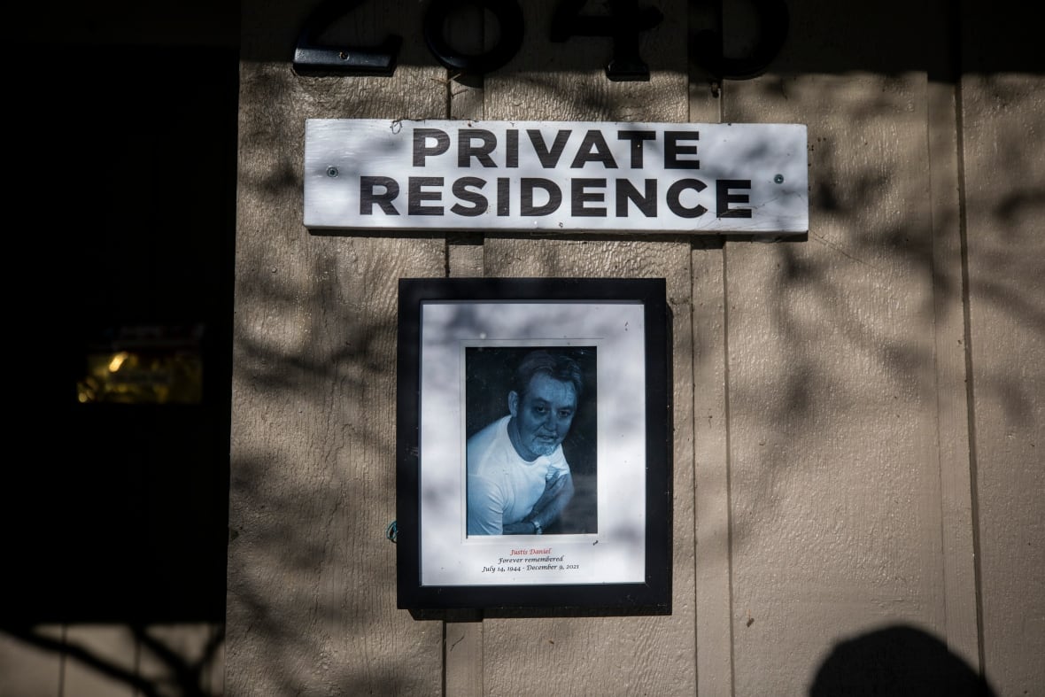 A framed photo of a man.