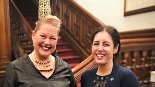 Jennifer Waldschütz (left) and Carley Parish (right) Two people standing in front of stairs inside an elite club in Saint John.