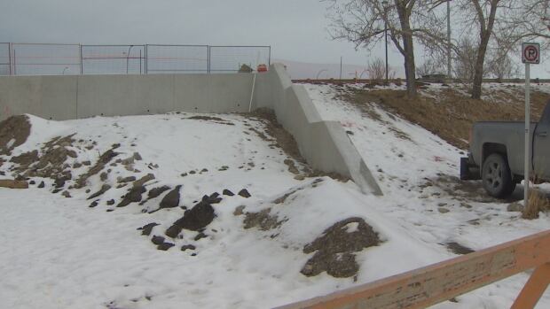 The city is installing new stairs and switchbacks to ease the grade from 34th Avenue S.W. up to the intersection at 33rd Avenue S.W. and Crowchild Trail S.W. at a pathway in Marda Loop. A snowy slope up to a hill.