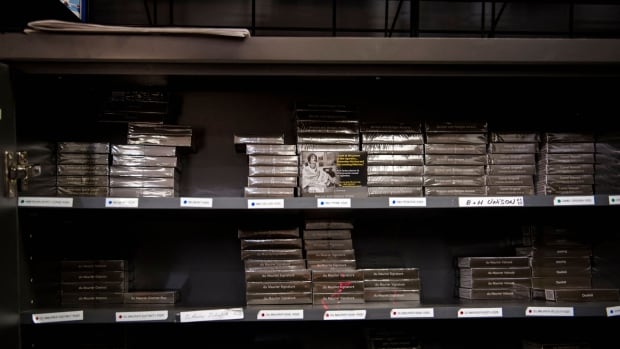 Cigarette packs are seen on the shelf of a Montreal convenience store.