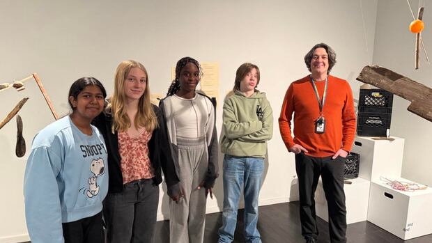 Shoes, toys and rusty bicycle pedals: Students create art from objects found in Schneider Creek