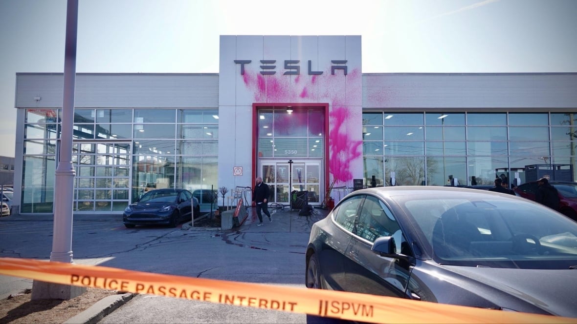 Protest against Elon Musk held outside of Tesla dealership in Kitchener