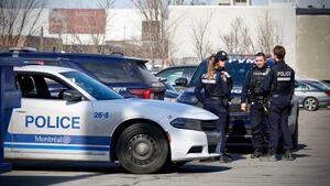 Police at the Tesla dealership in Montreal on Wednesday. The company has been the target of an increased number of cases of vandalism in the United States and beyond.