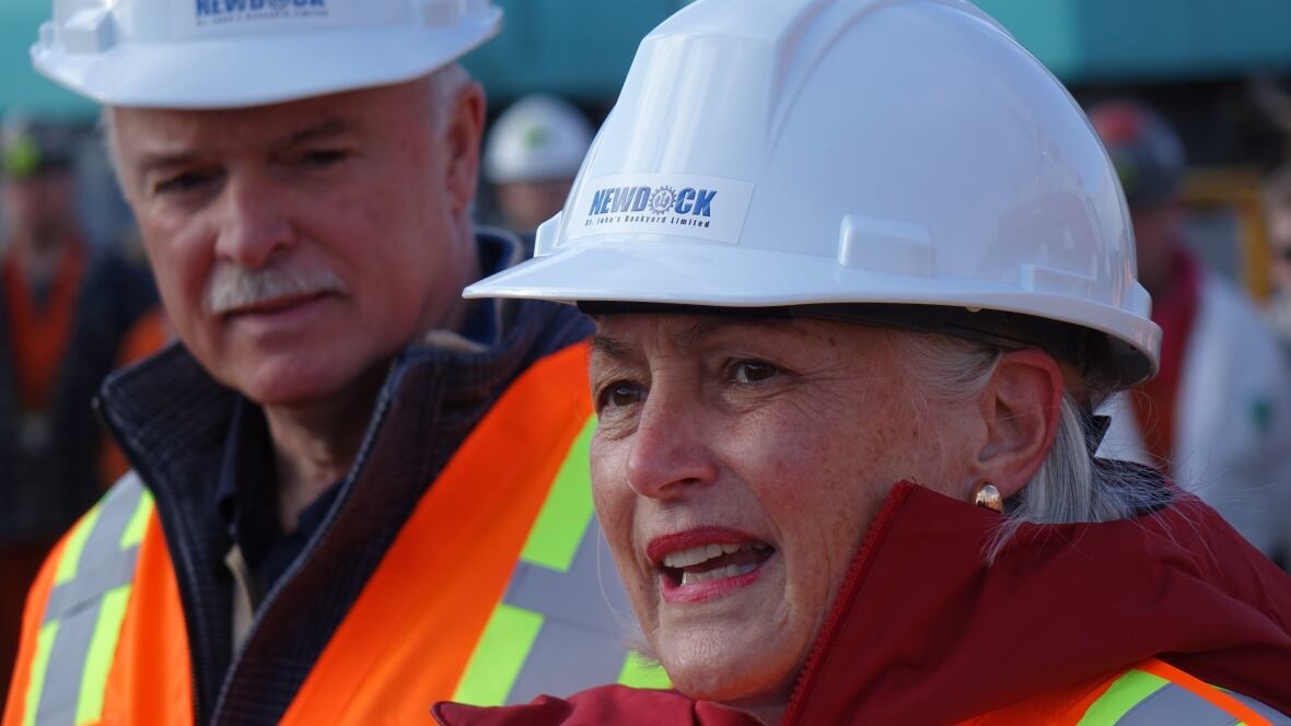 Close up   of pistillate   wearing hardhat 