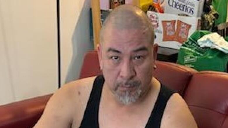 A antheral   with a shaved caput  and grey beard.