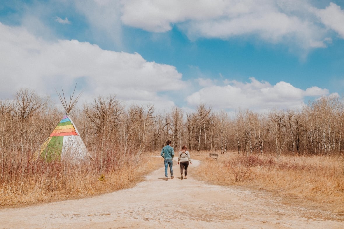 People walking a trail at FortWhyte Alive