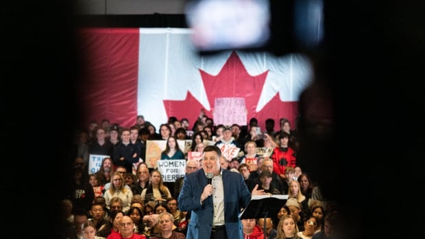 Andrew Lawton, the federal Conservative candidate for Elgin-St. Thomas-London South speaks at party leader Pierre Poilievre's "Bring It Home" rally in London, Ontario on March 9, 2025.