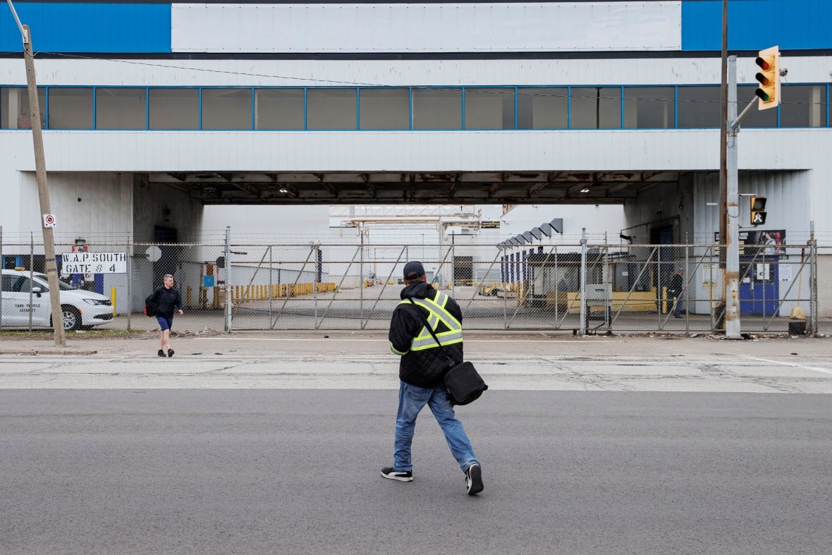 A worker leaves the Stellantis Windsor Assembly Plant.