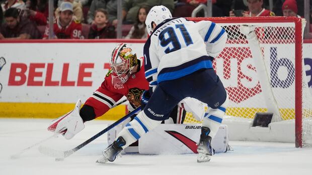 Winnipeg Jets score Central Division title after defeating Blackhawks 5-4