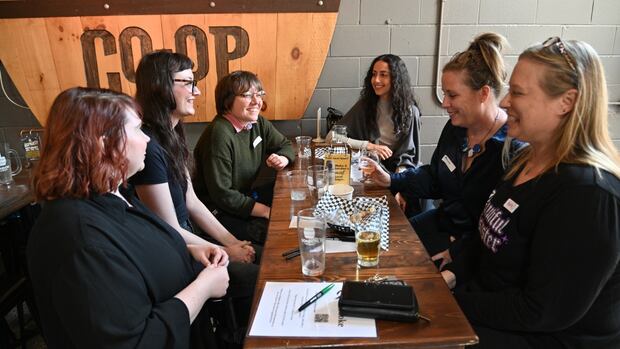 Local moms gather to talk politics over a pint